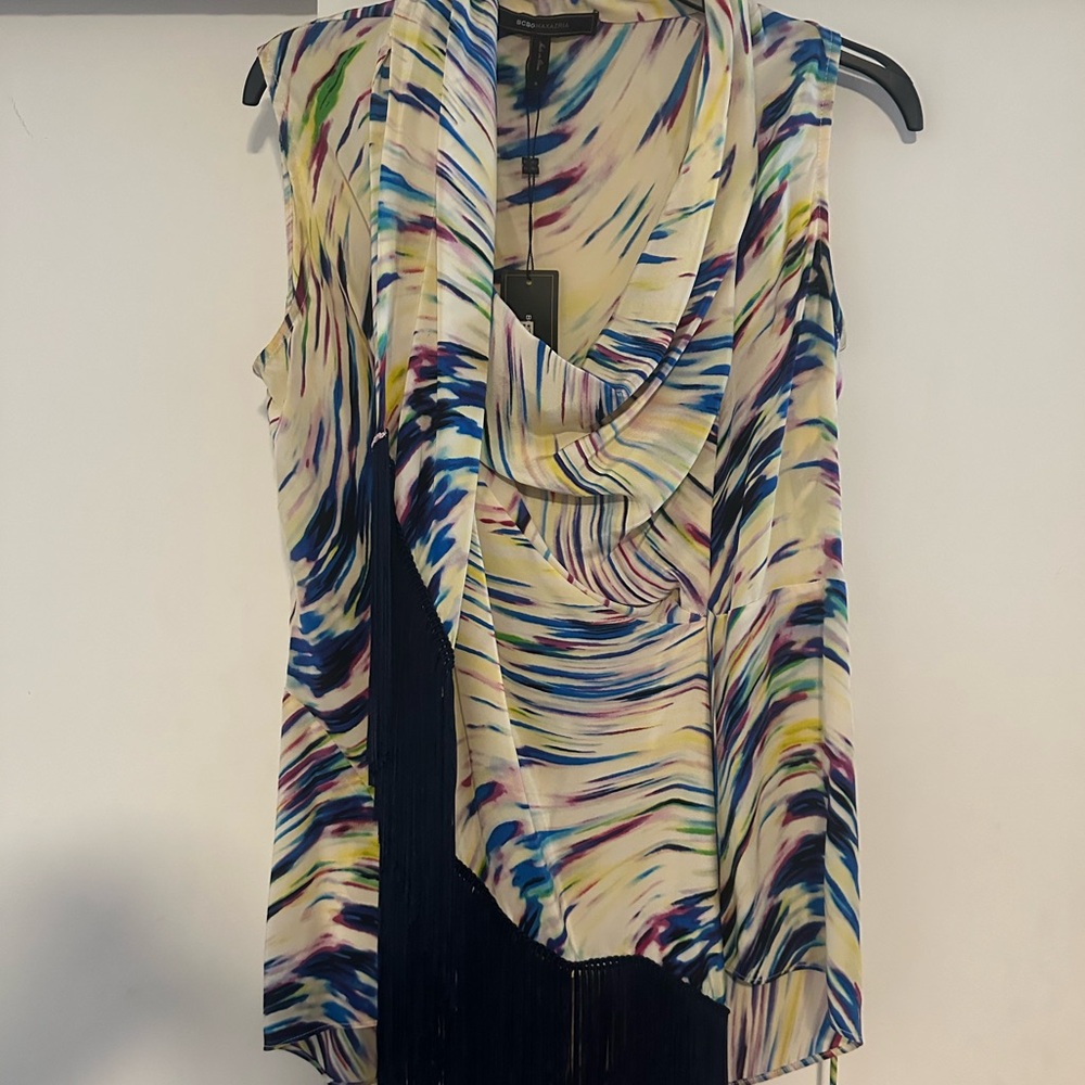 Sexy blouse with tassels. Multiple color to causal or evening wear.